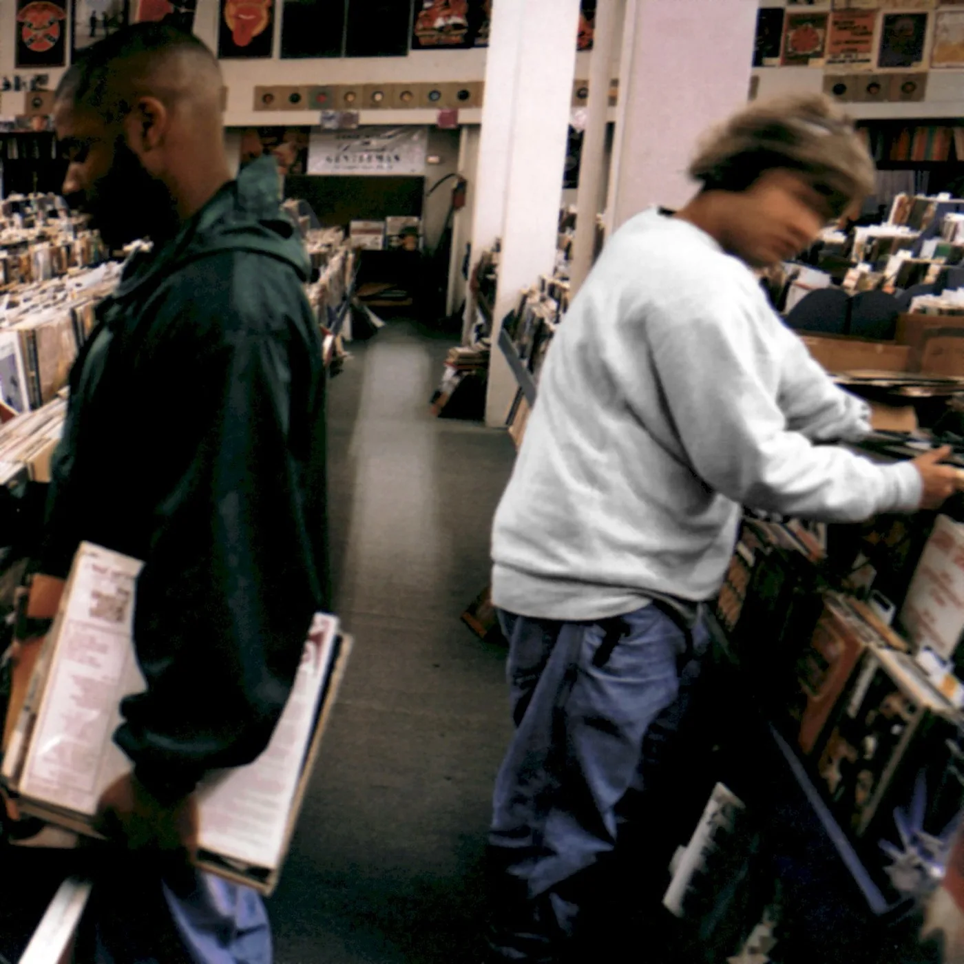 DJ Shadow Endtroducing album cover — crate diggers in a record shop