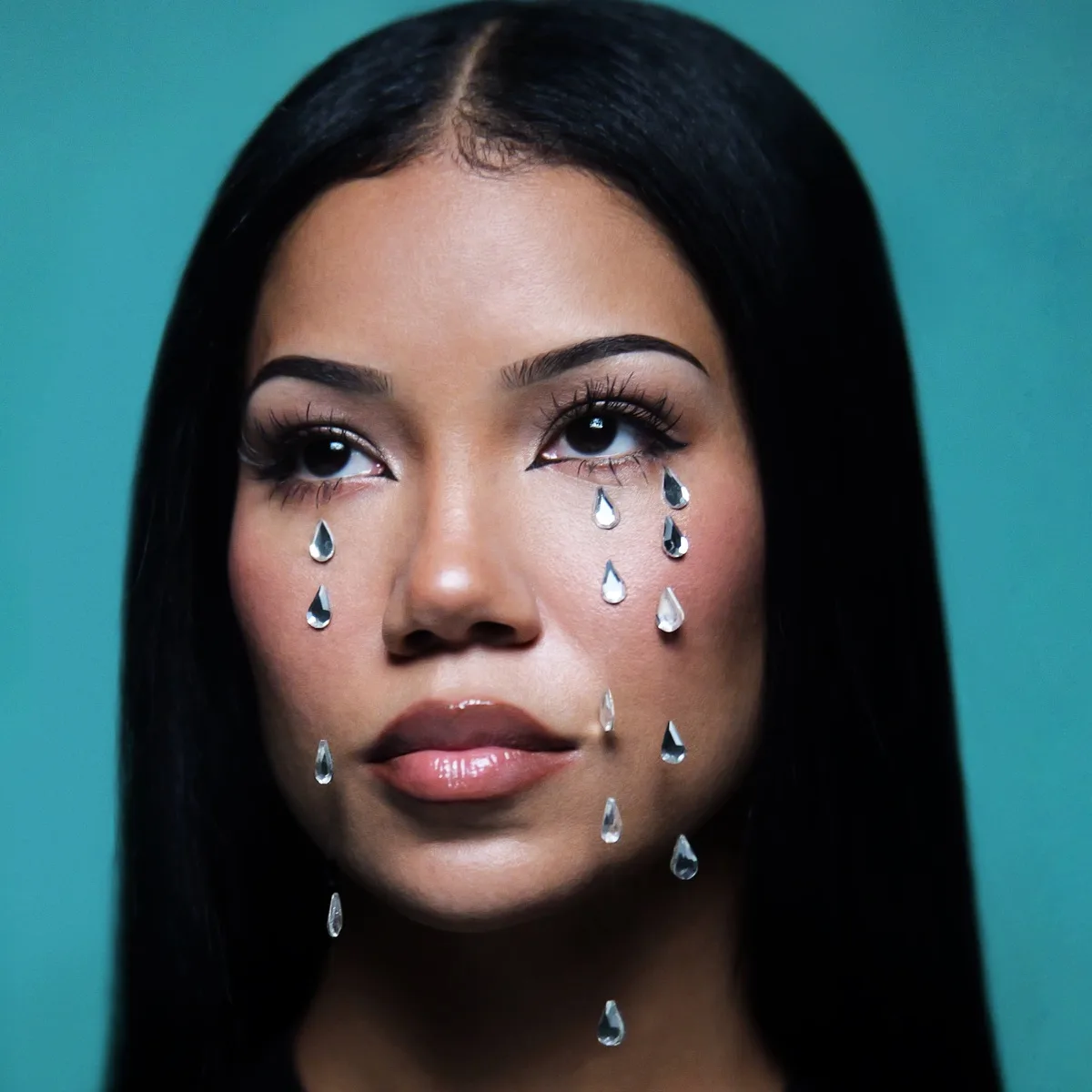Jhené Aiko close-up on teal, crystal gems falling like tears under both eyes: Westside Whimsy album cover